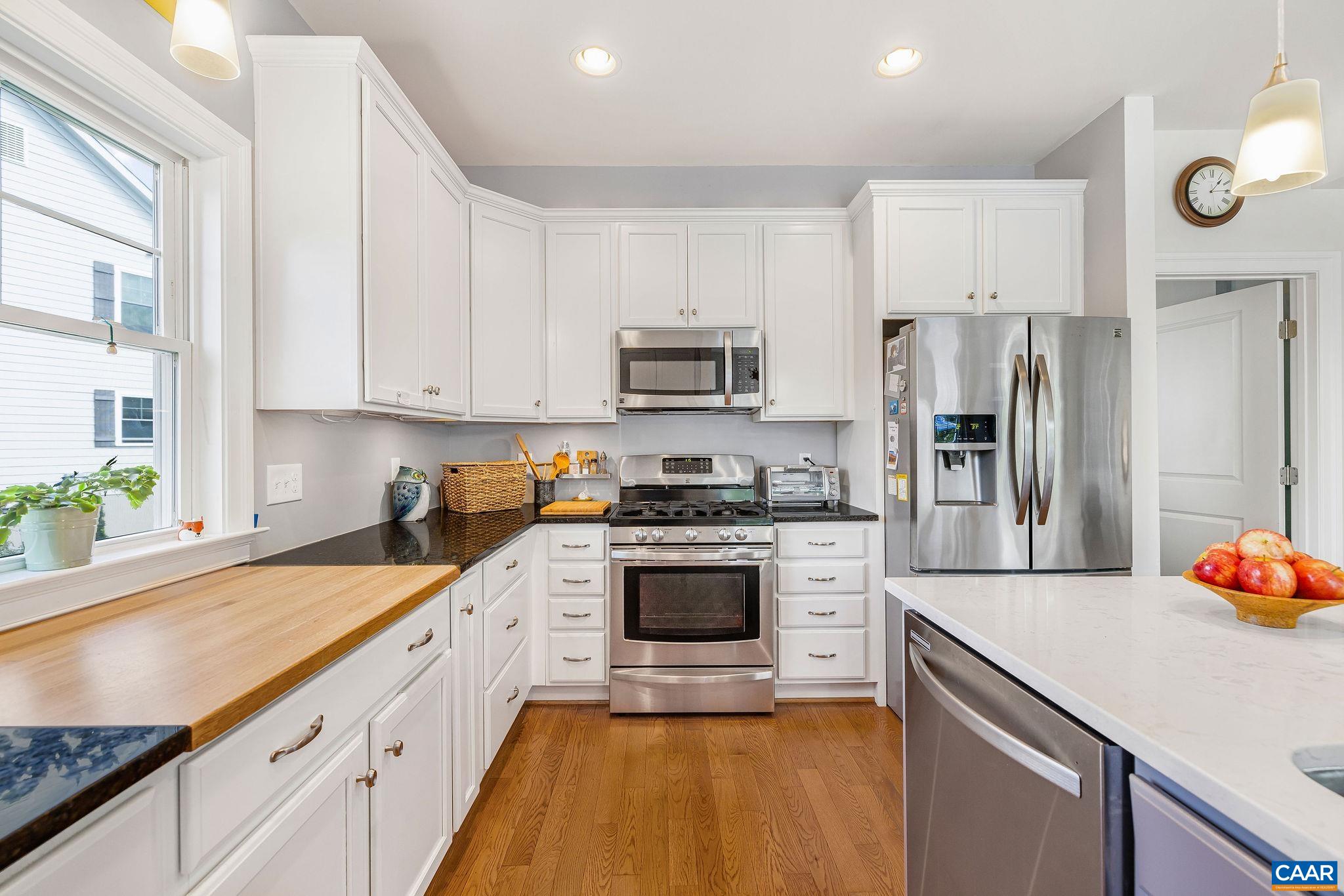 537 Trailside Drive Charlottesville, VA 22911 - Photo 18 of 52 a kitchen with a sink stove and refrigerator