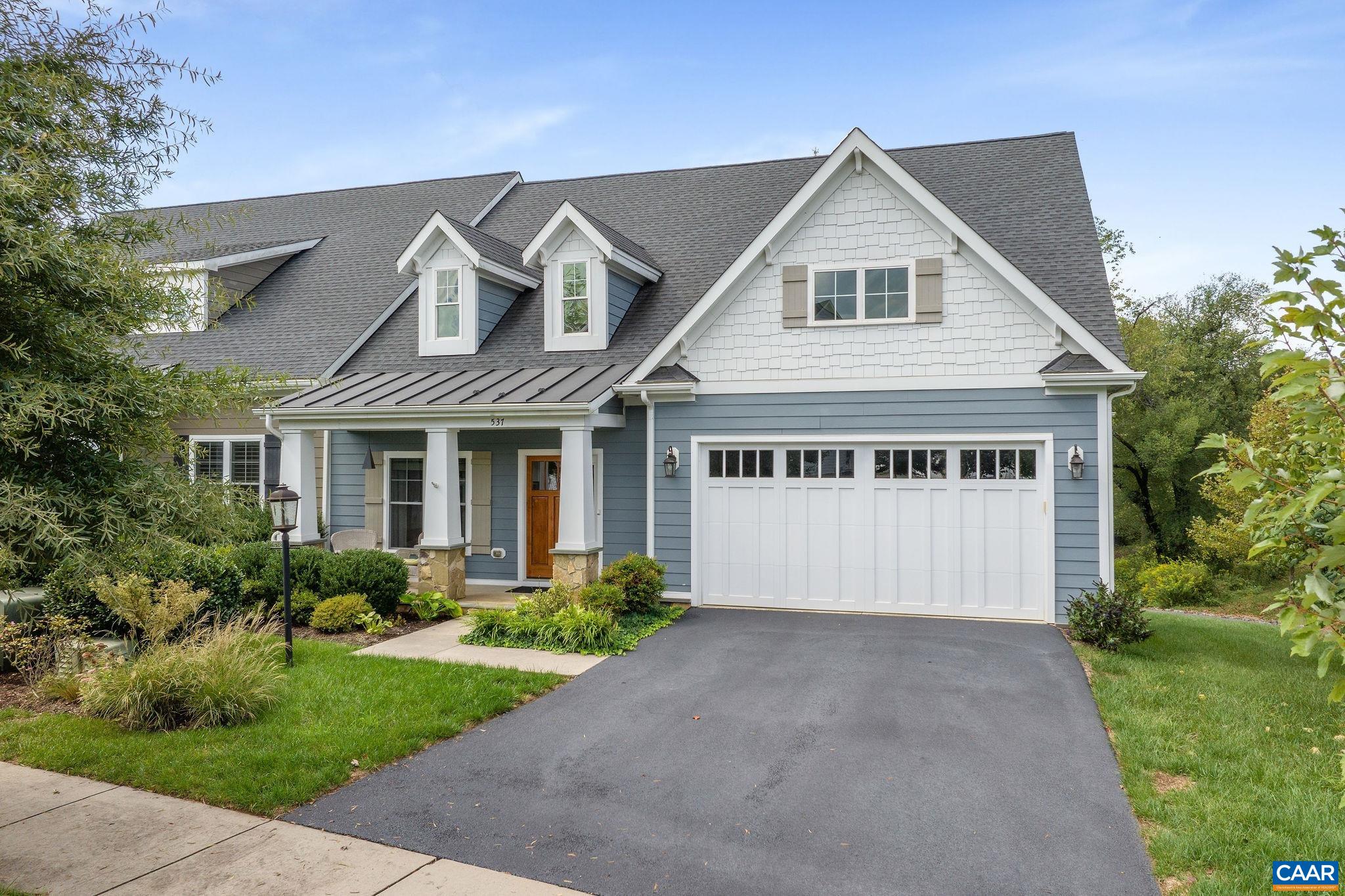 537 Trailside Drive Charlottesville, VA 22911 - Photo 2 of 52 a view of a white house with a big yard and potted plants