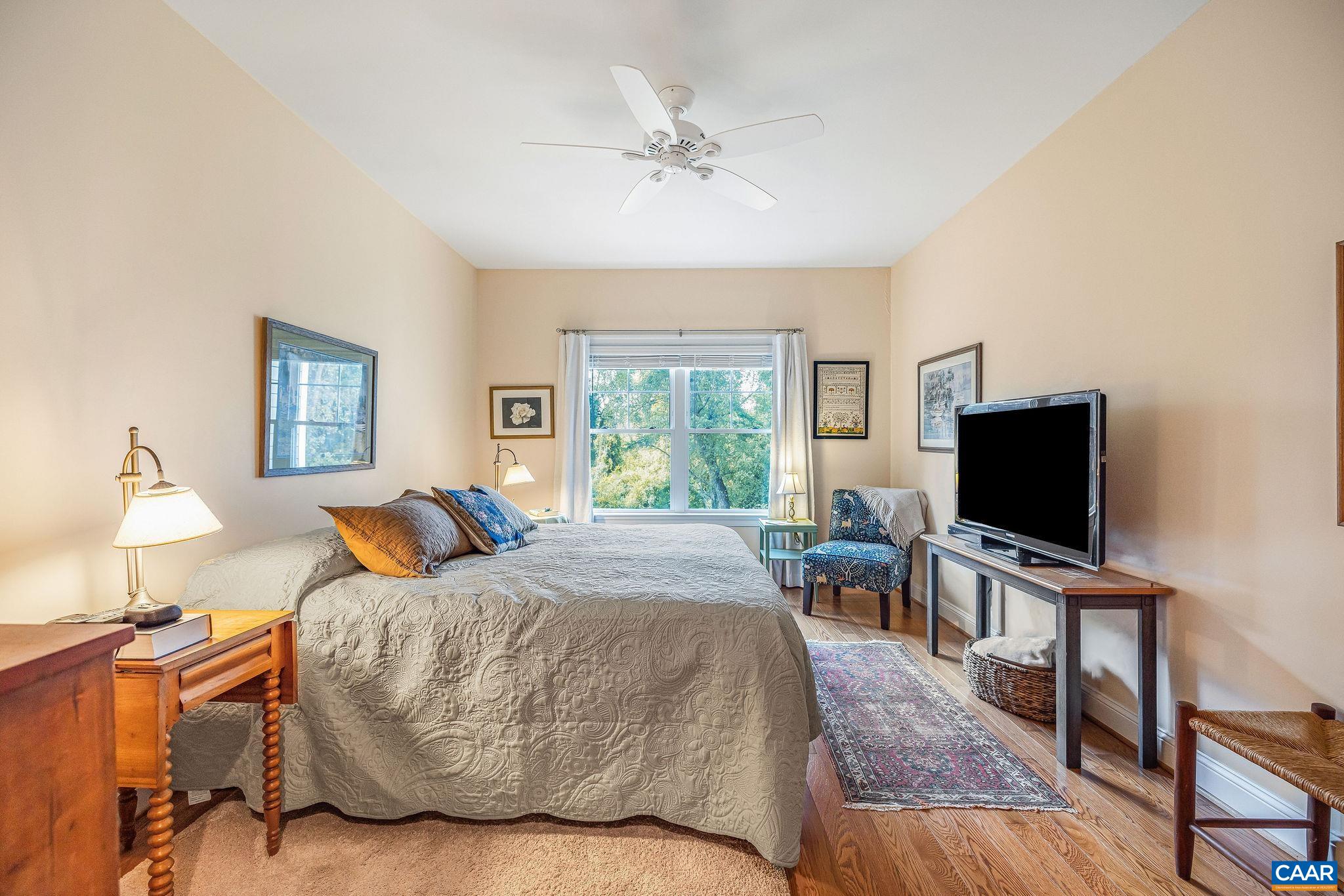 537 Trailside Drive Charlottesville, VA 22911 - Photo 21 of 52 a living room with furniture and a flat screen tv