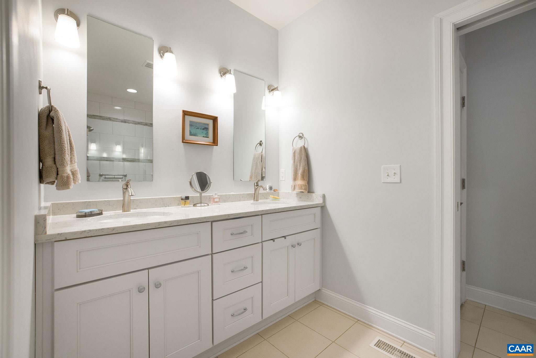 537 Trailside Drive Charlottesville, VA 22911 - Photo 23 of 52 a bathroom with a double vanity sink and mirror
