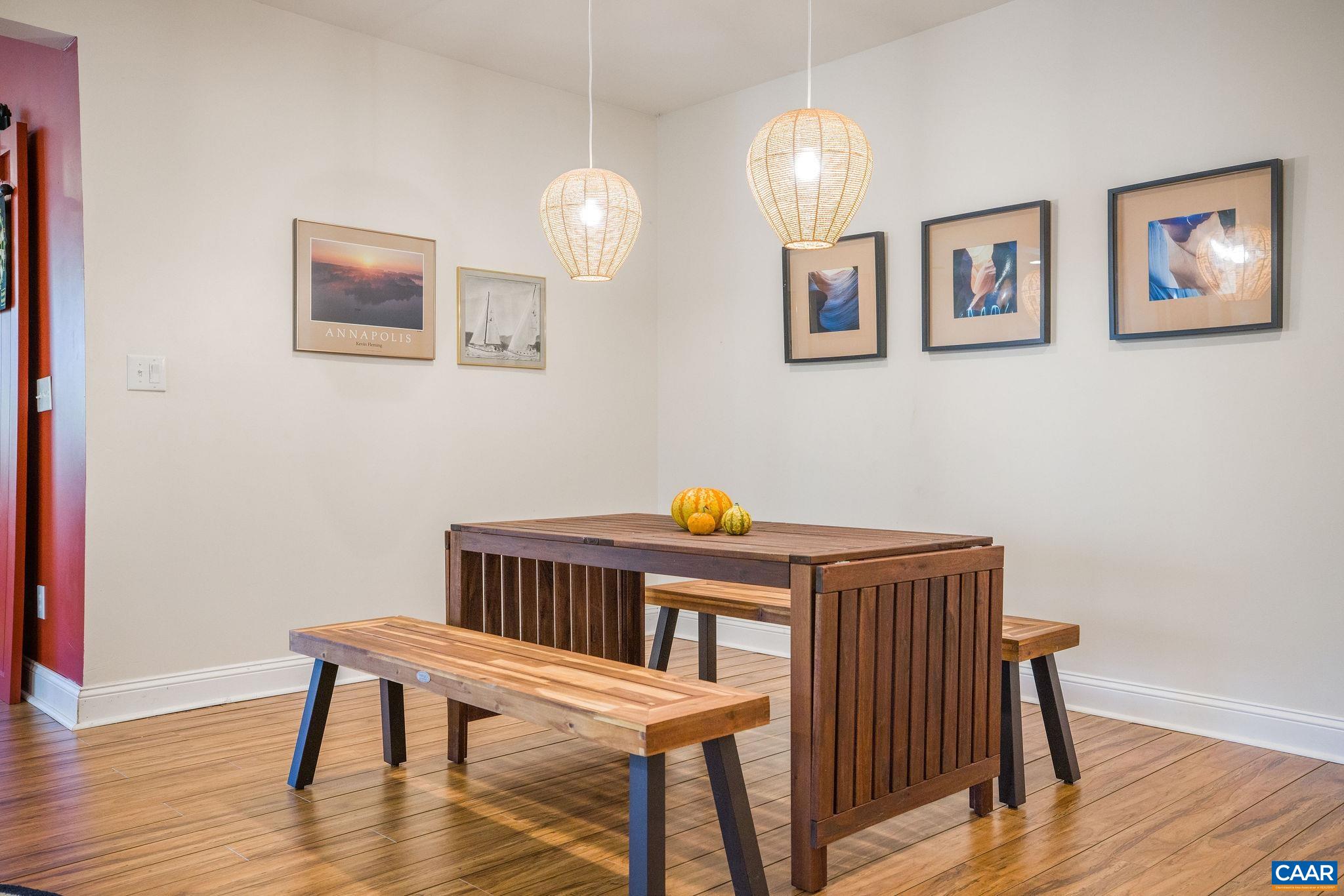 537 Trailside Drive Charlottesville, VA 22911 - Photo 39 of 52 a view of a dining room with furniture and wooden floor