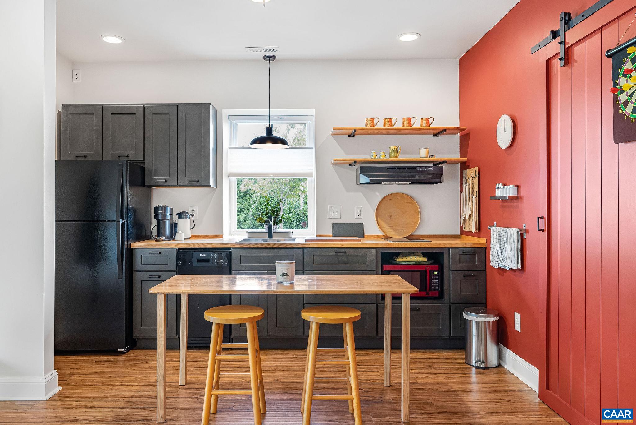 537 Trailside Drive Charlottesville, VA 22911 - Photo 40 of 52 a kitchen with a sink cabinets and window