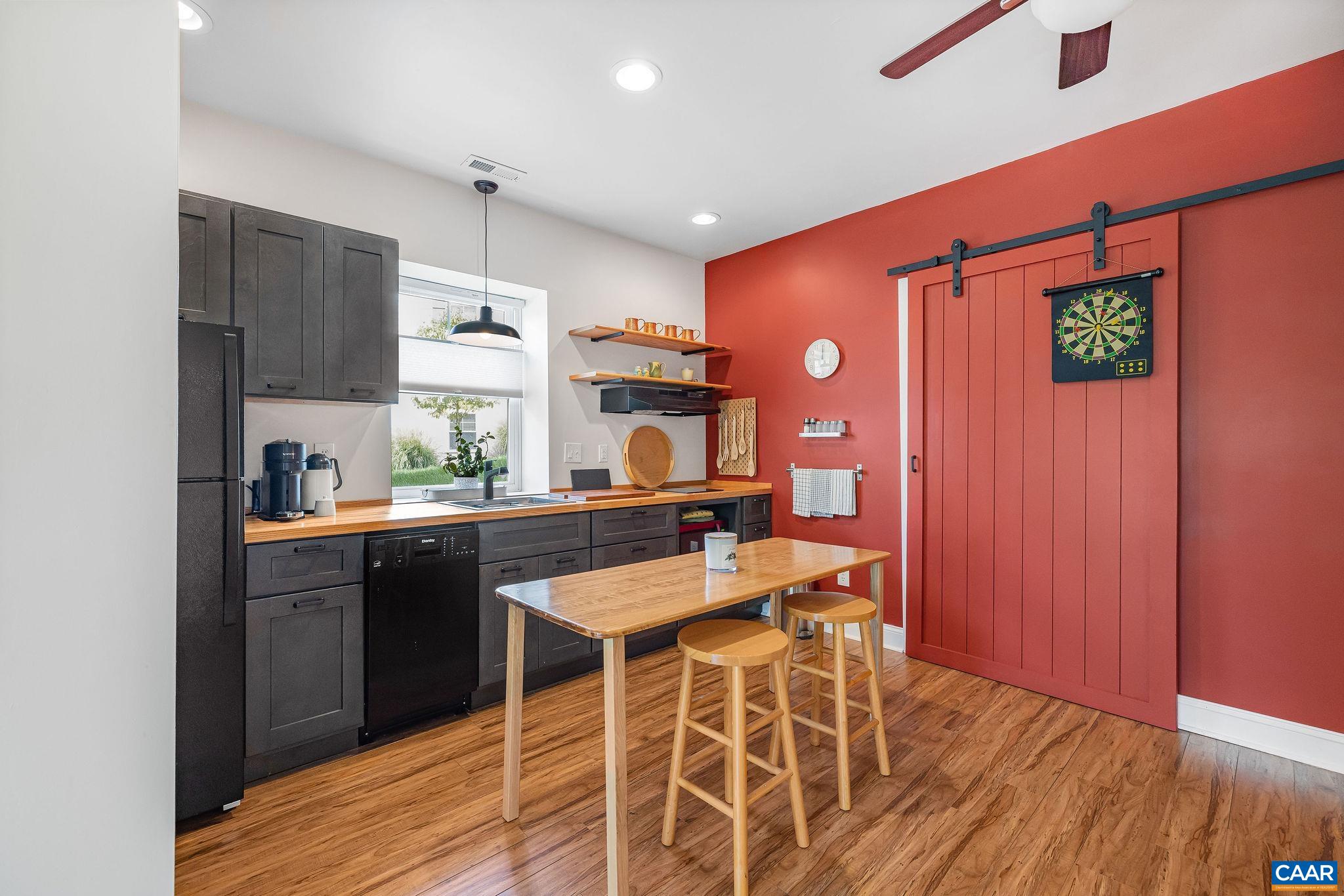537 Trailside Drive Charlottesville, VA 22911 - Photo 41 of 52 a kitchen with stainless steel appliances granite countertop a sink and cabinets