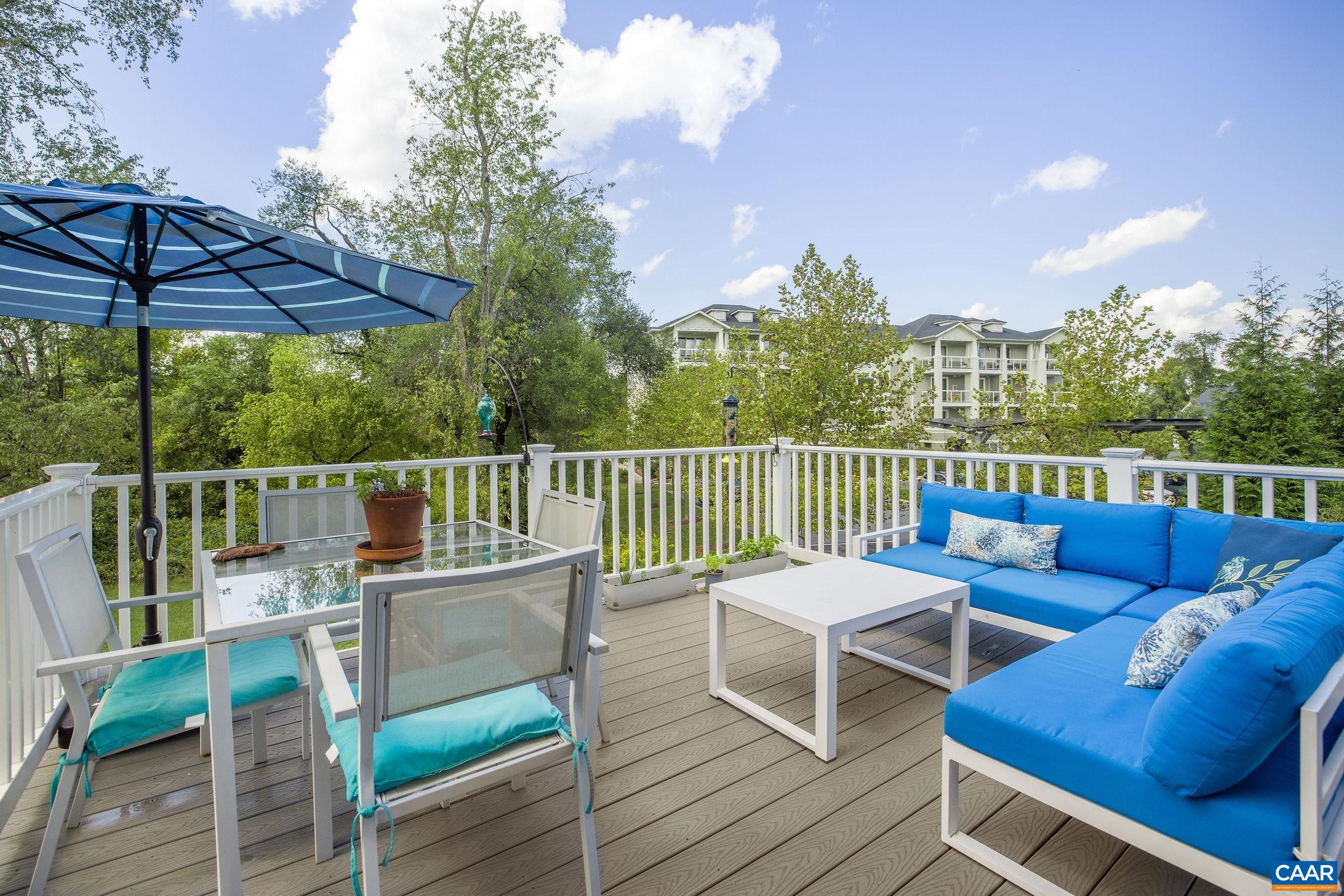 537 Trailside Drive Charlottesville, VA 22911 - Photo 46 of 52 a view of a chair and tables on the roof deck