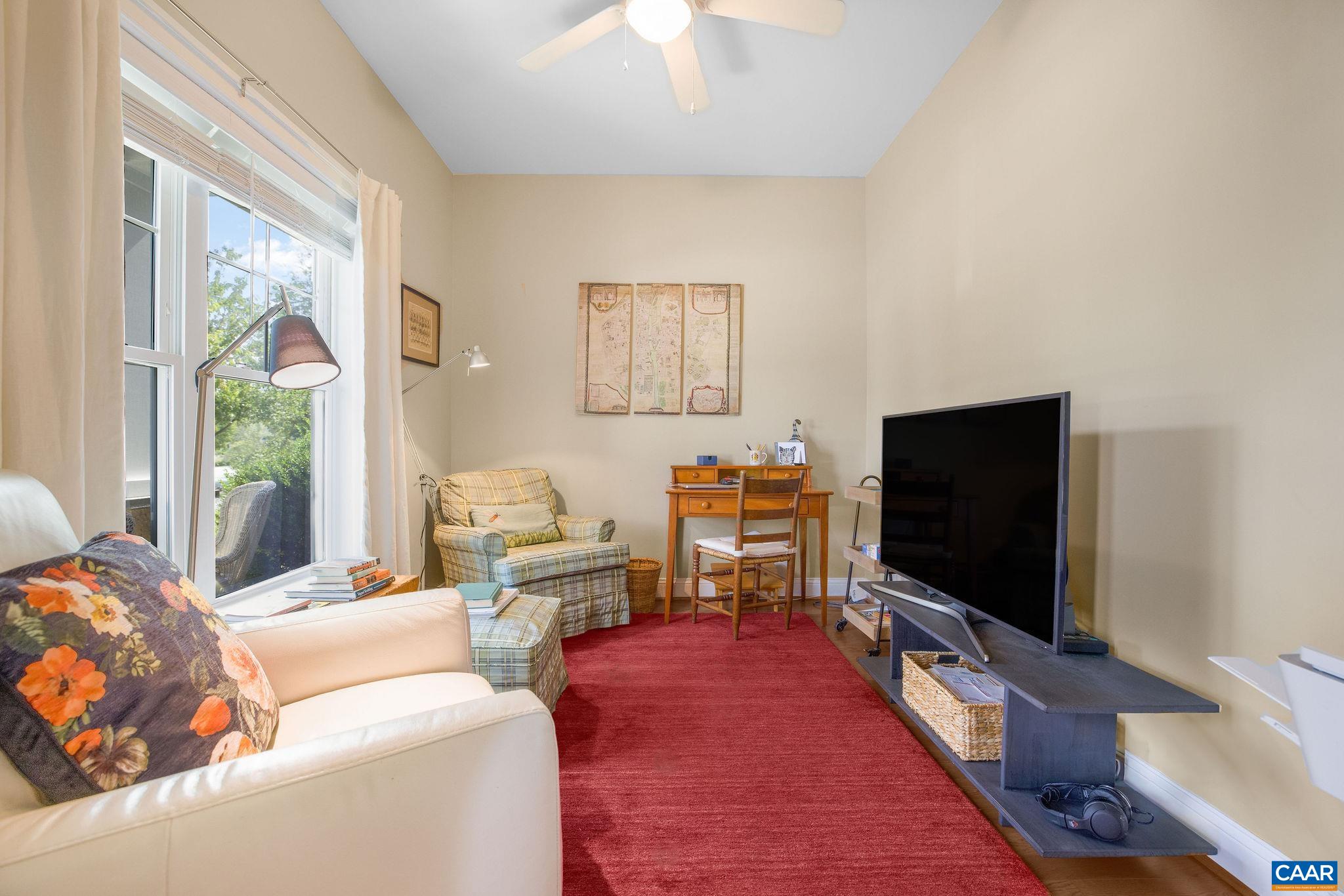 537 Trailside Drive Charlottesville, VA 22911 - Photo 10 of 52 a living room with furniture and a flat screen tv