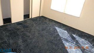 245 Avon Road Dillwyn, VA 23936 - Photo 3 of 8 a view of a dry yard with wooden floor