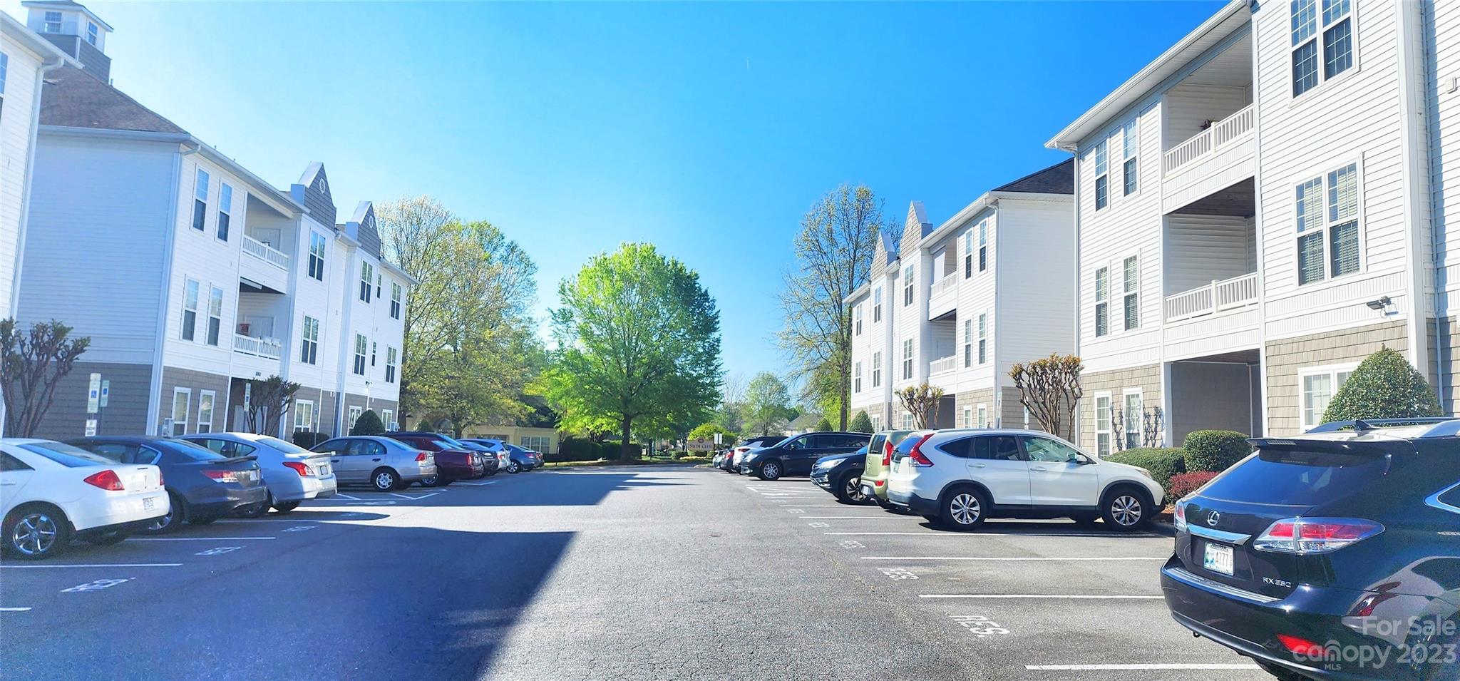 10125 Westmoreland Road, Unit 2D Cornelius, NC 28031 - Photo 3 of 36 a cars parked in front of a building