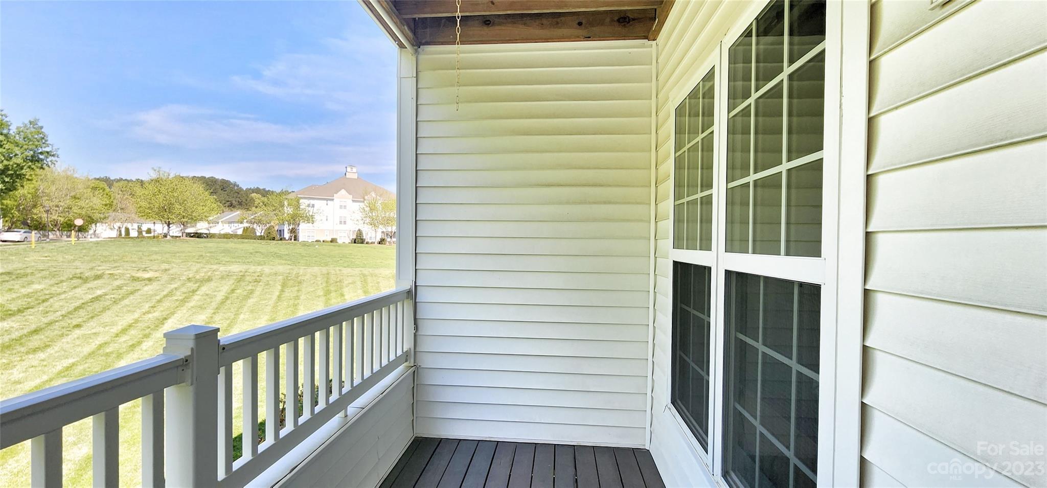 10125 Westmoreland Road, Unit 2D Cornelius, NC 28031 - Photo 7 of 36 a view of a balcony with an ocean view