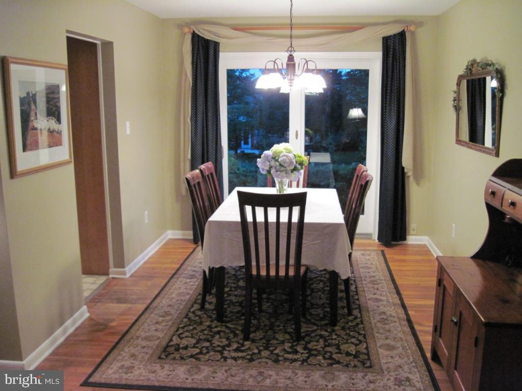 1033 Preston Road Lancaster, PA 17601 - Photo 7 of 35 a view of a dining room with furniture and chandelier