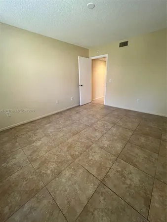 an empty room with an entryway