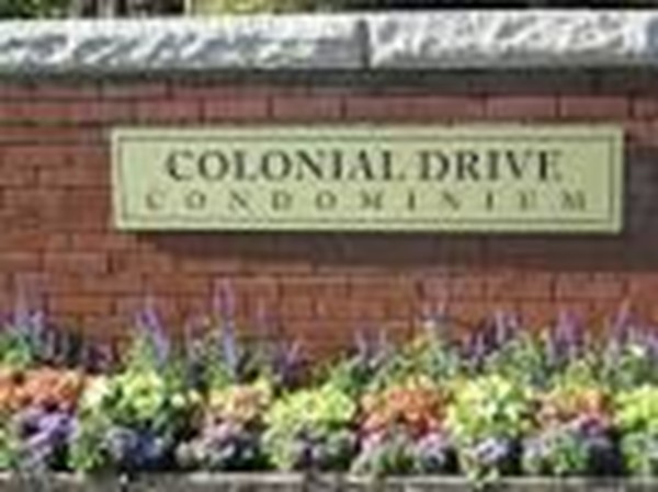 2 Colonial Drive, Unit 6 Andover, MA 01810 - Photo 12 of 12 a close up of a sign
