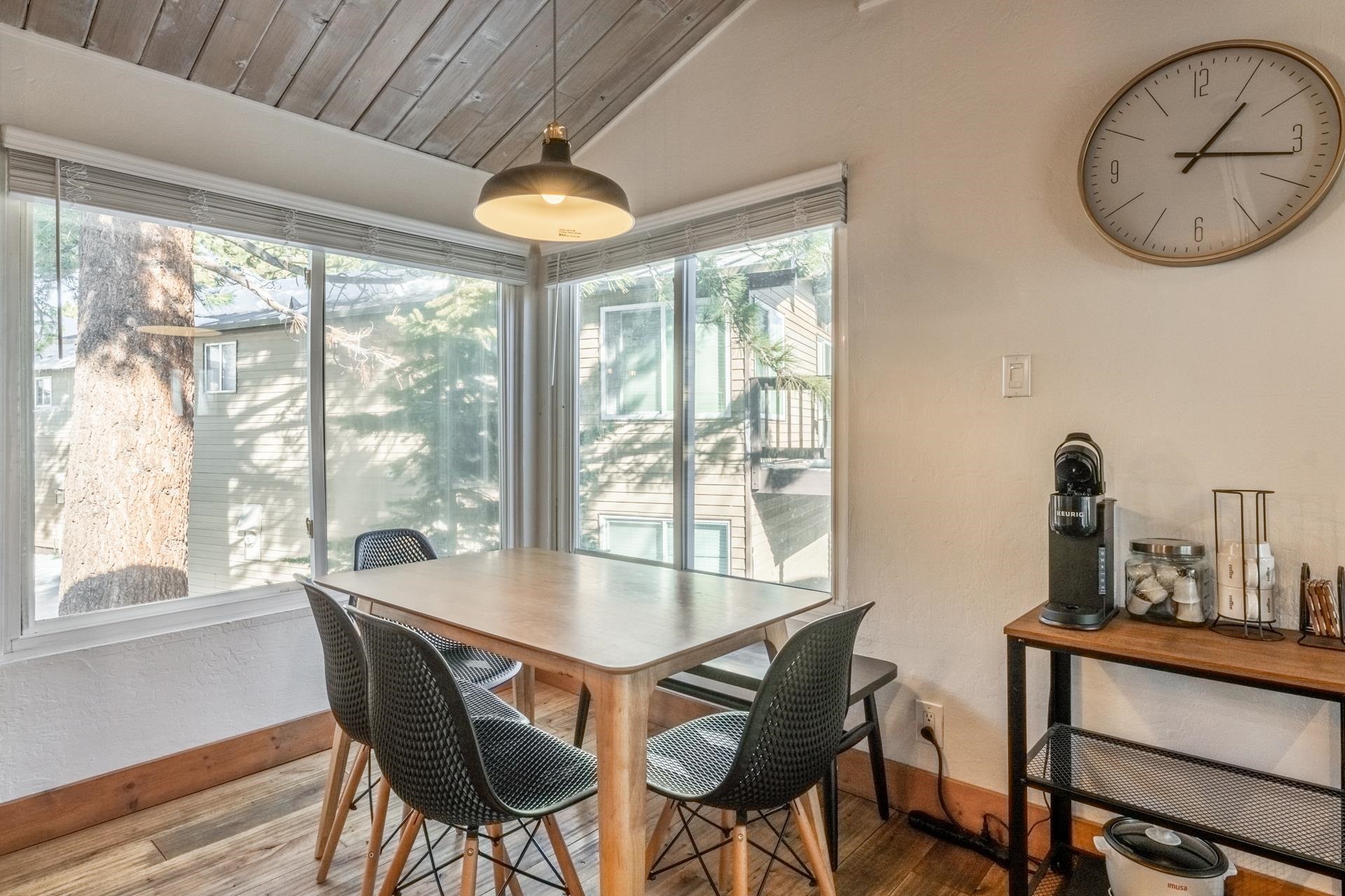 2290 Sierra Nevada Road, Unit 43 Mammoth Lakes, CA 93546 - Photo 11 of 33 a view of a dining room with furniture window and outside view