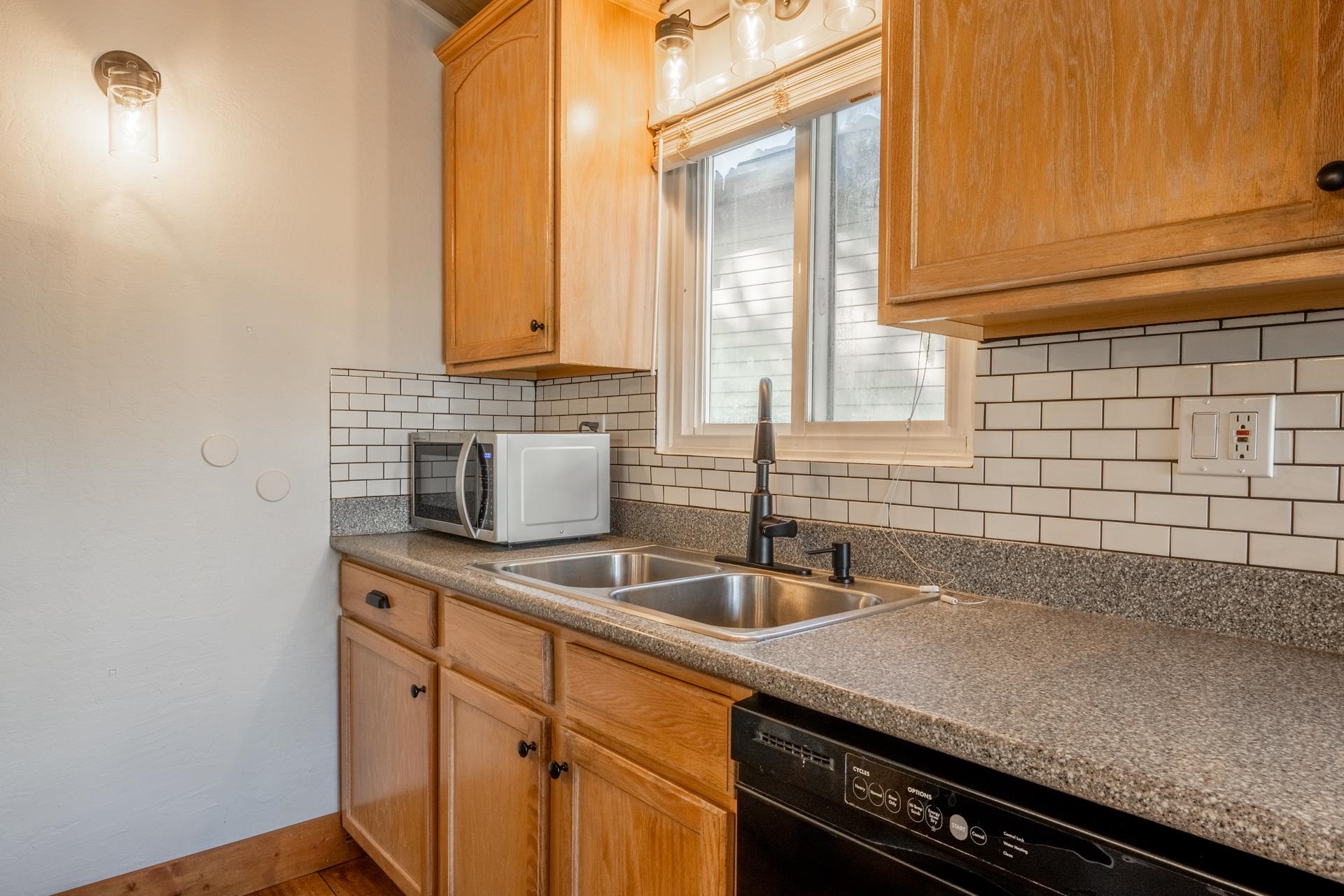 2290 Sierra Nevada Road, Unit 43 Mammoth Lakes, CA 93546 - Photo 13 of 33 a kitchen with a sink and cabinets