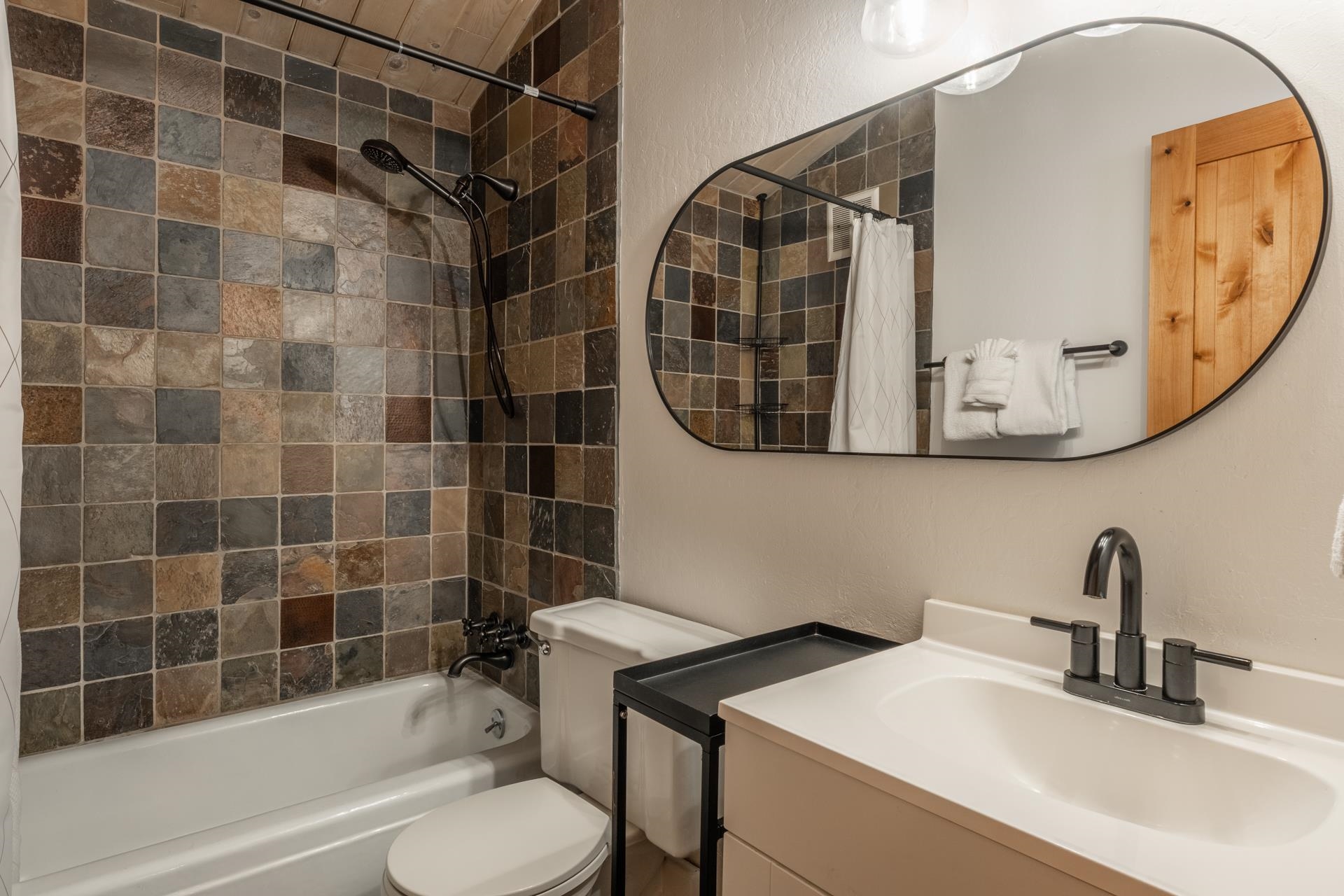 2290 Sierra Nevada Road, Unit 43 Mammoth Lakes, CA 93546 - Photo 16 of 33 a bathroom with a sink toilet and shower