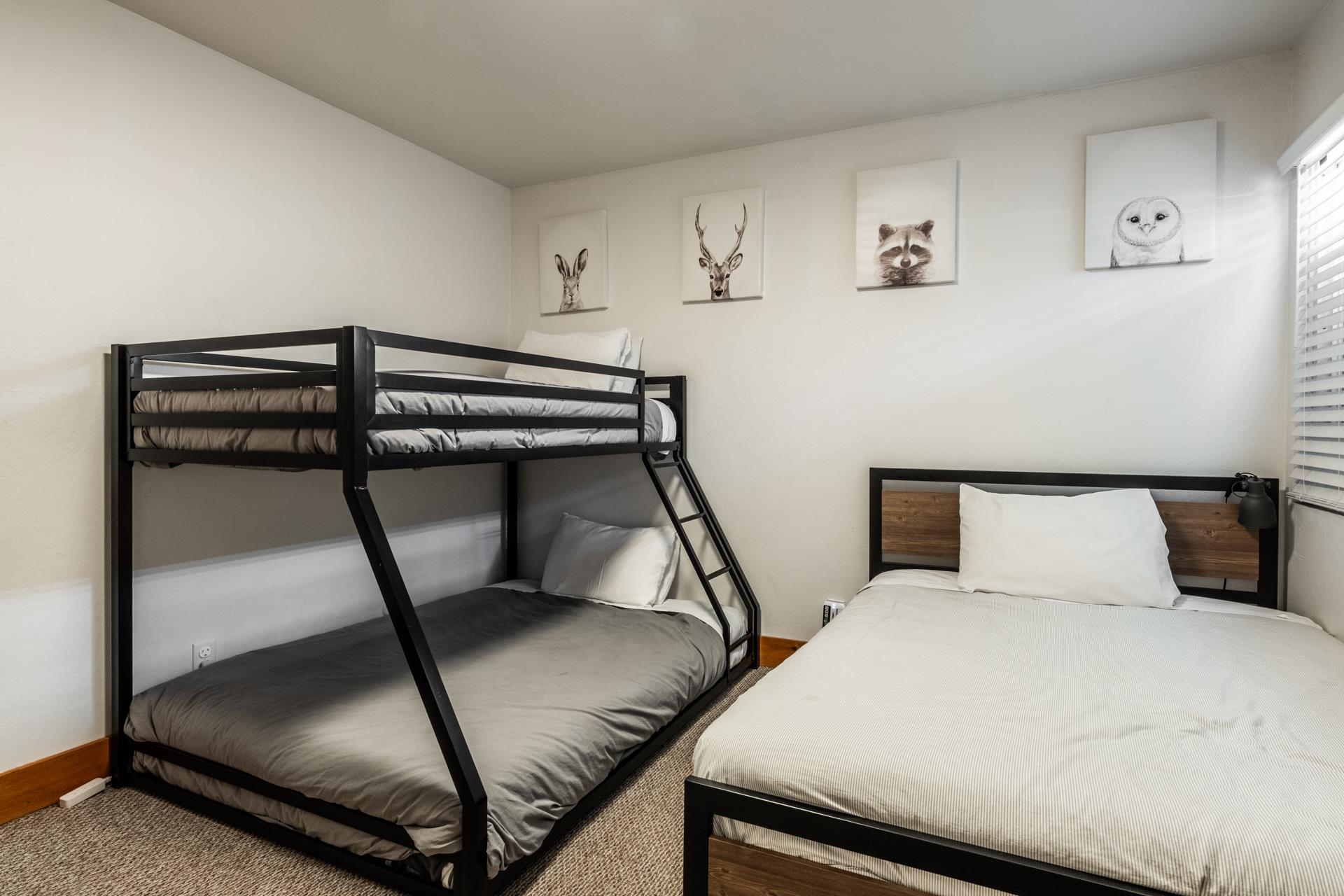 2290 Sierra Nevada Road, Unit 43 Mammoth Lakes, CA 93546 - Photo 24 of 33 a bedroom with a bed and a window