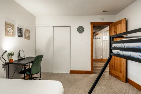 a workspace room with furniture