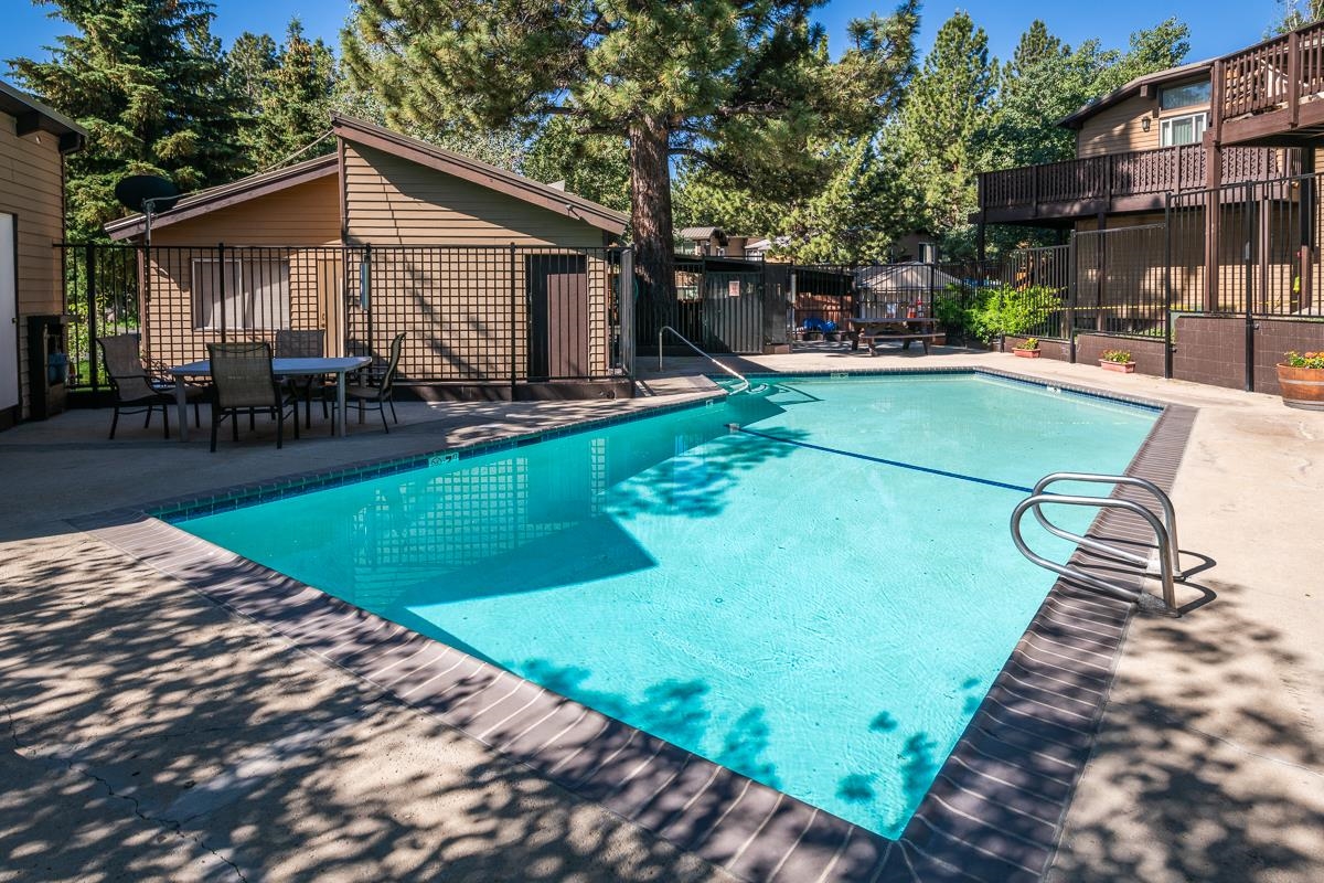 2290 Sierra Nevada Road, Unit 43 Mammoth Lakes, CA 93546 - Photo 28 of 33 a view of a house with backyard and sitting area