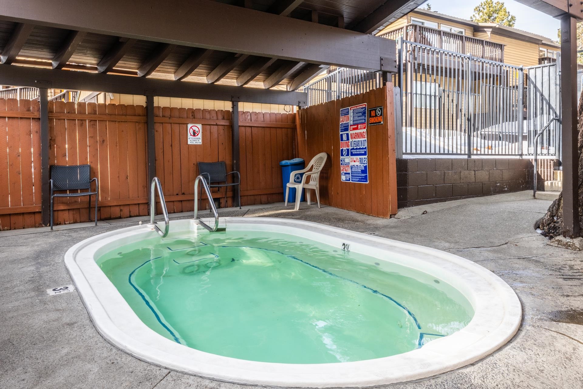 2290 Sierra Nevada Road, Unit 43 Mammoth Lakes, CA 93546 - Photo 30 of 33 a view of a swimming pool with a patio