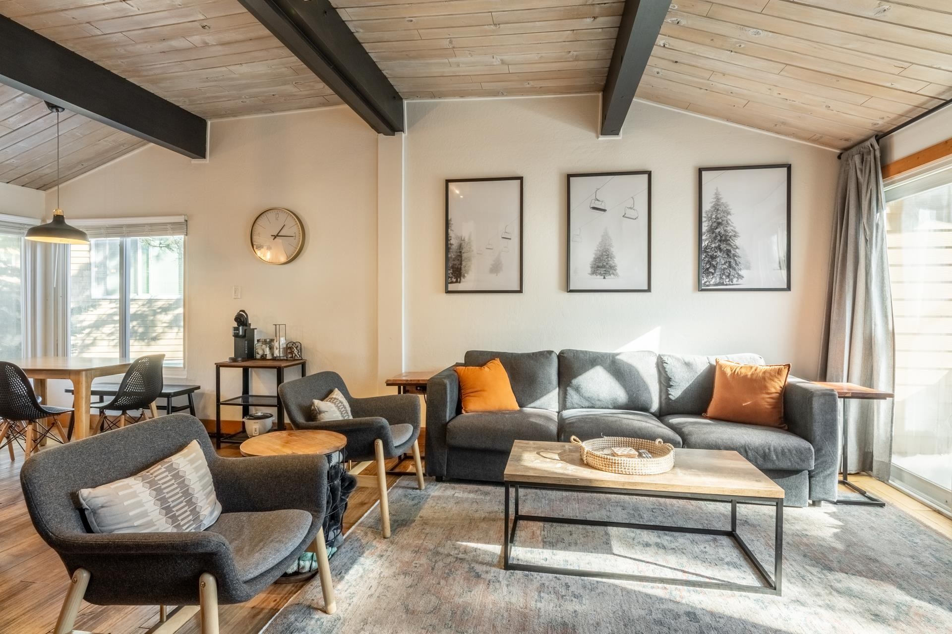 2290 Sierra Nevada Road, Unit 43 Mammoth Lakes, CA 93546 - Photo 5 of 33 a living room with furniture a large window and a rug