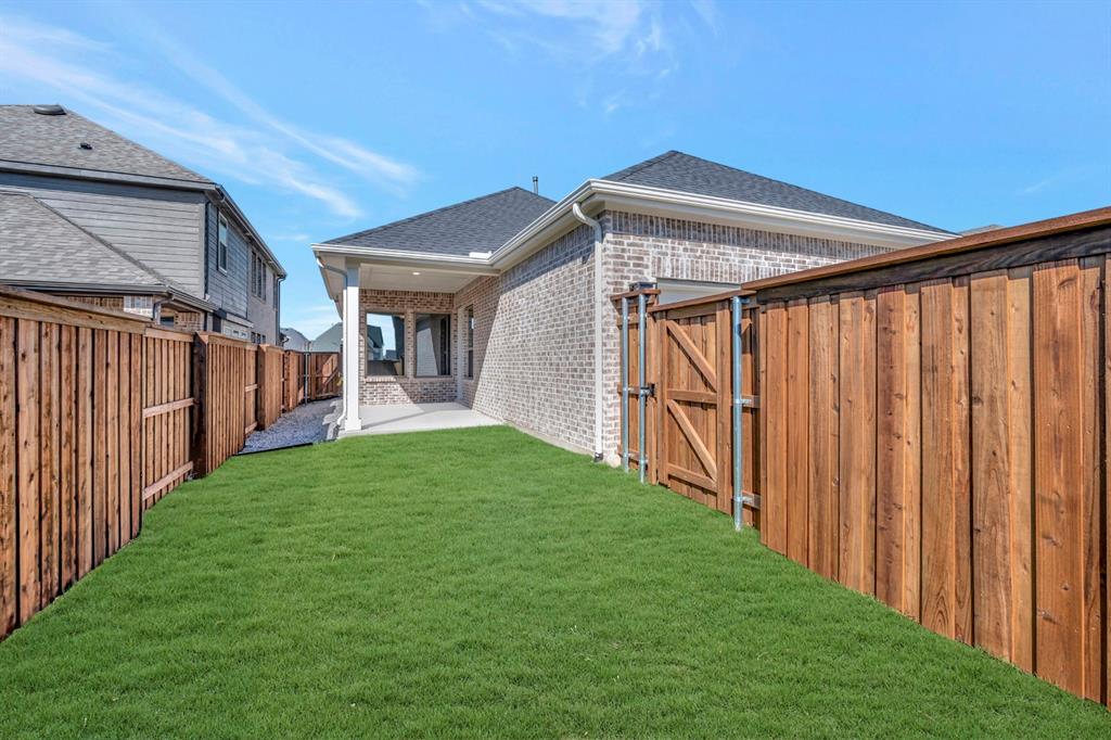 1857 Lightner Road Van Alstyne, TX 75495 - Photo 2 of 29 a view of an entrance to house with yard
