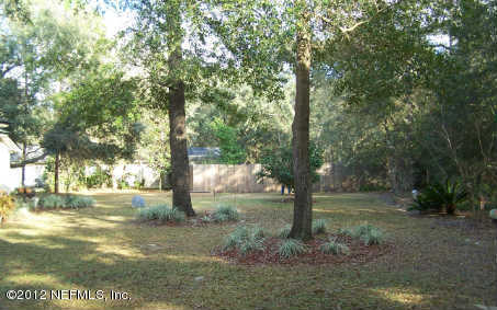 97285 Castle Ridge Drive Yulee, FL 32097 - Photo 21 of 23 a view of outdoor space with trees all around