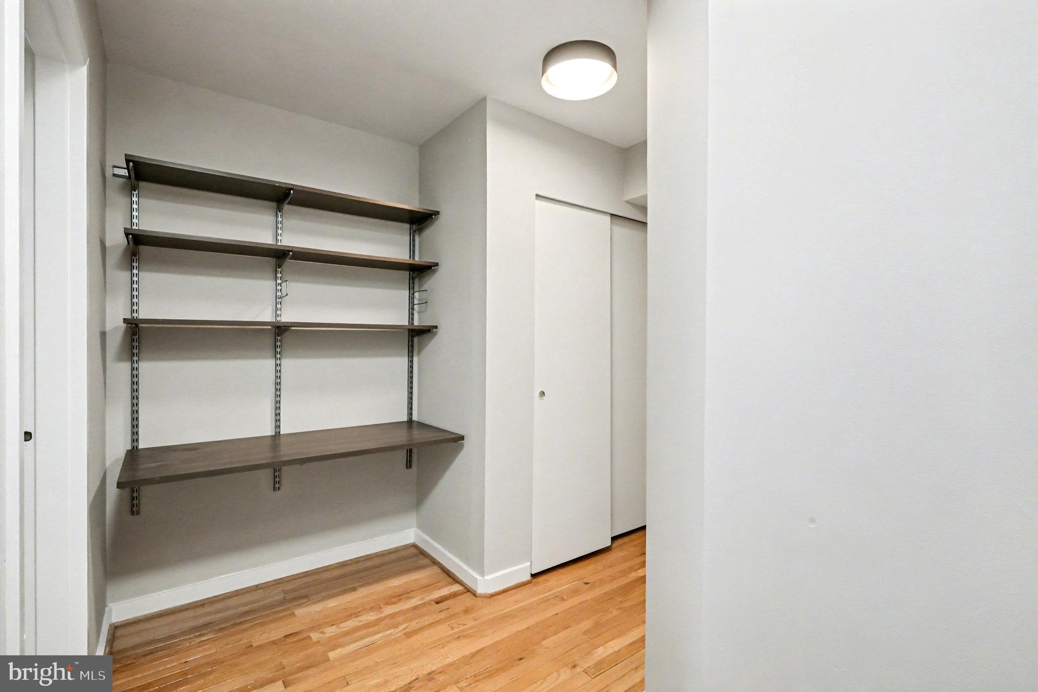 66 New York Avenue Northwest, Unit 206 Washington, DC 20001 - Photo 13 of 24 a view of an empty room with a closet
