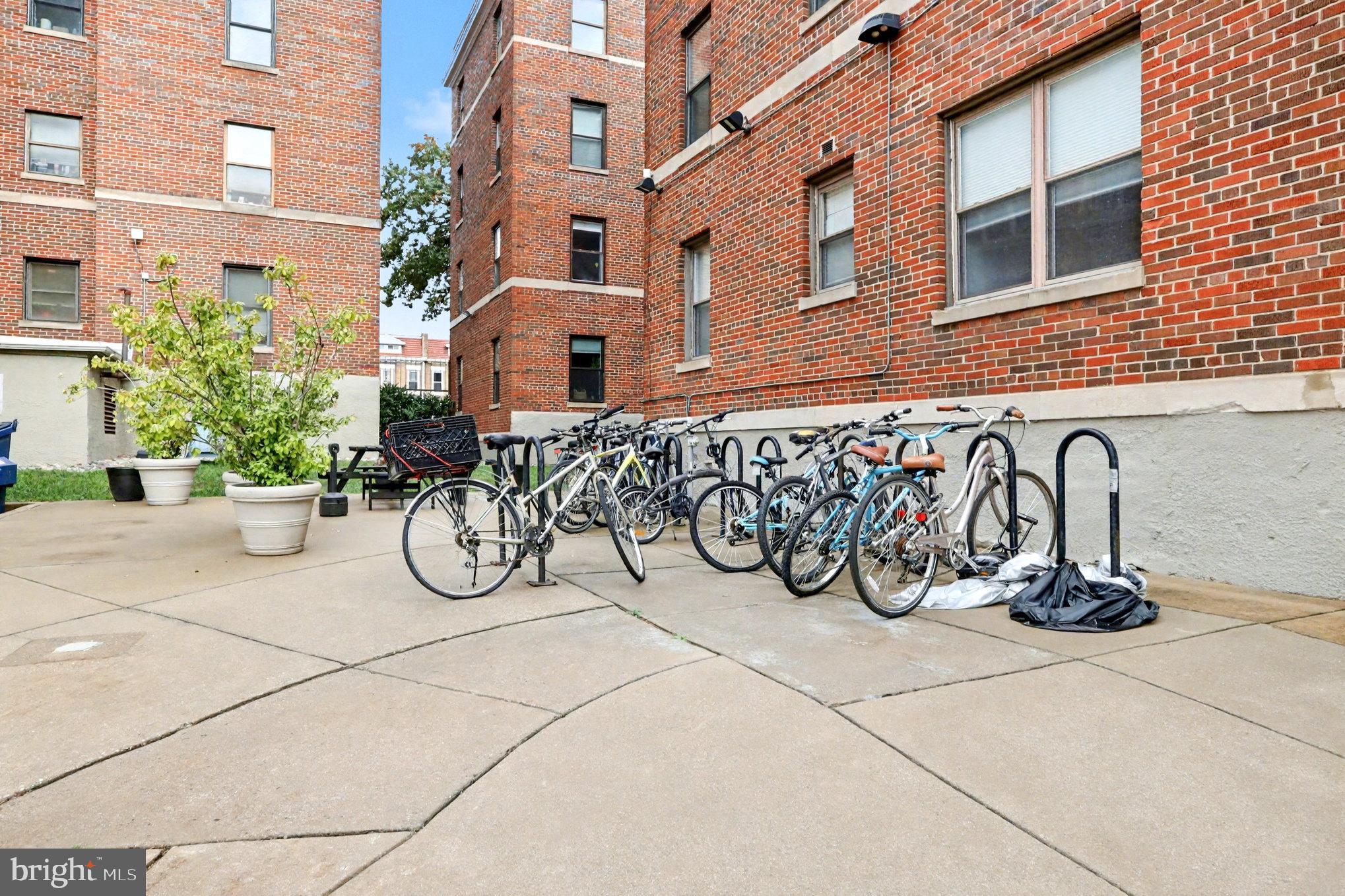 66 New York Avenue Northwest, Unit 206 Washington, DC 20001 - Photo 19 of 24 a view of a bench with potted plants