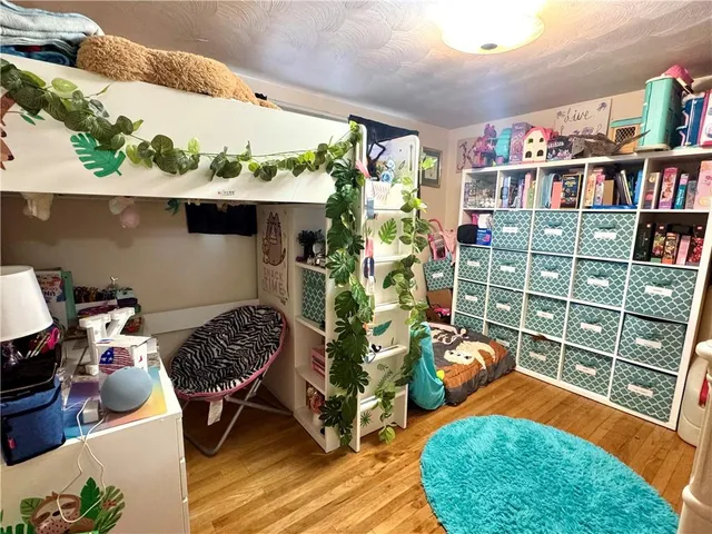 a room with lots of books and more things on it