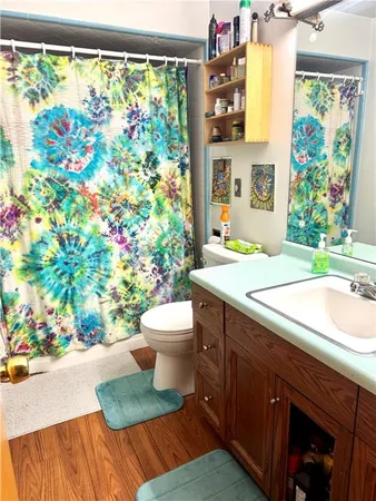 a bathroom with a sink and a toilet