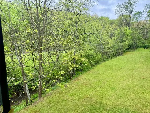 a view of a house with a garden