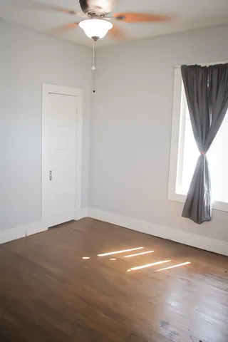 a bathroom with a toilet and shower