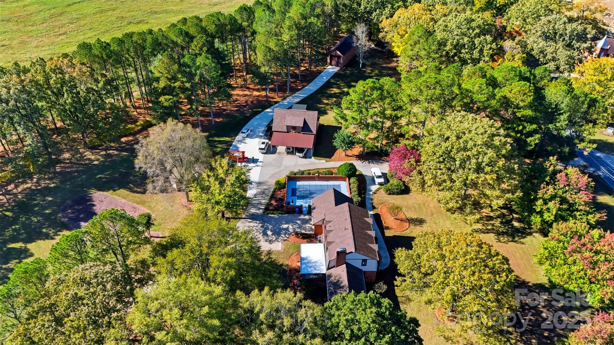 a bird view of house and front yard