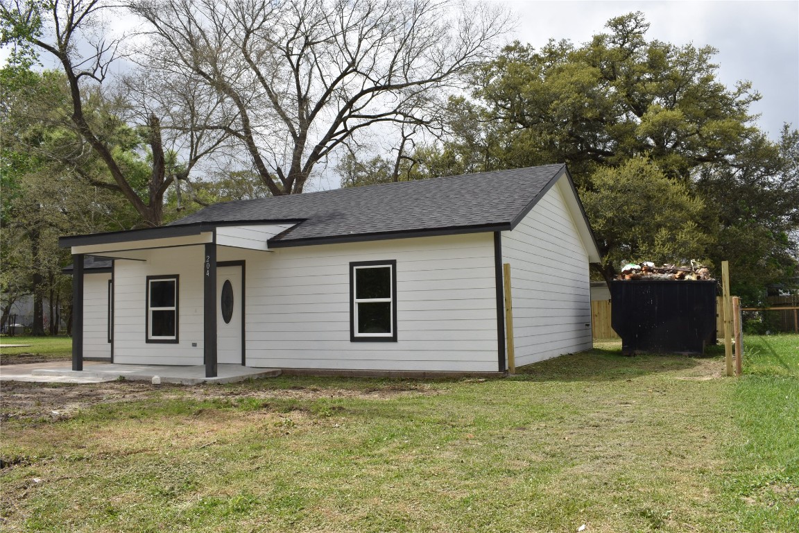 204 Texas Daisetta, TX 77533 - Photo 2 of 21 a view of a house with a yard