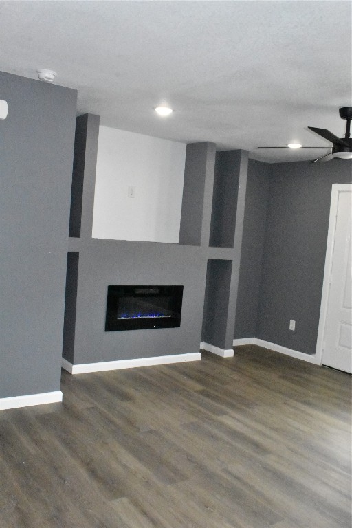 204 Texas Daisetta, TX 77533 - Photo 4 of 21 a view of an empty room with wooden floor and a fireplace