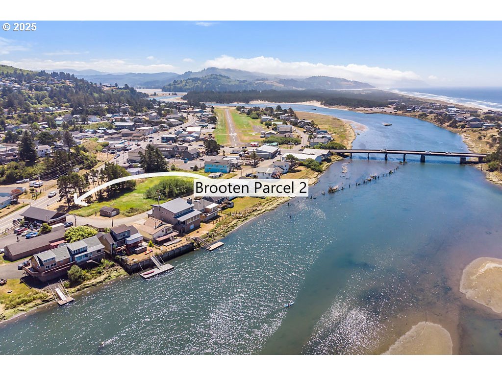 Brooten Road, Unit PARCEL2 Pacific City, OR 97135 - Photo 5 of 15 an aerial view of residential houses with outdoor space