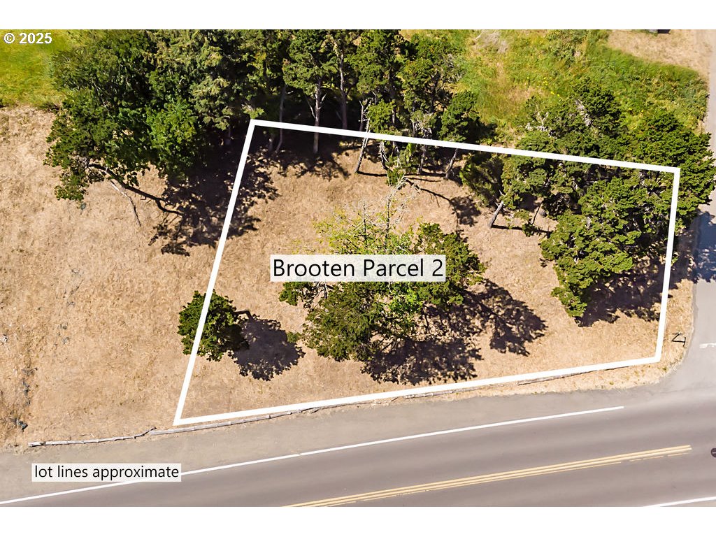 Brooten Road, Unit PARCEL2 Pacific City, OR 97135 - Photo 10 of 15 a view of a wooden fence and a window
