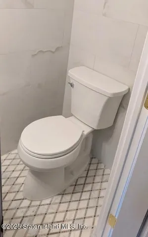 a view of a hallway with staircase