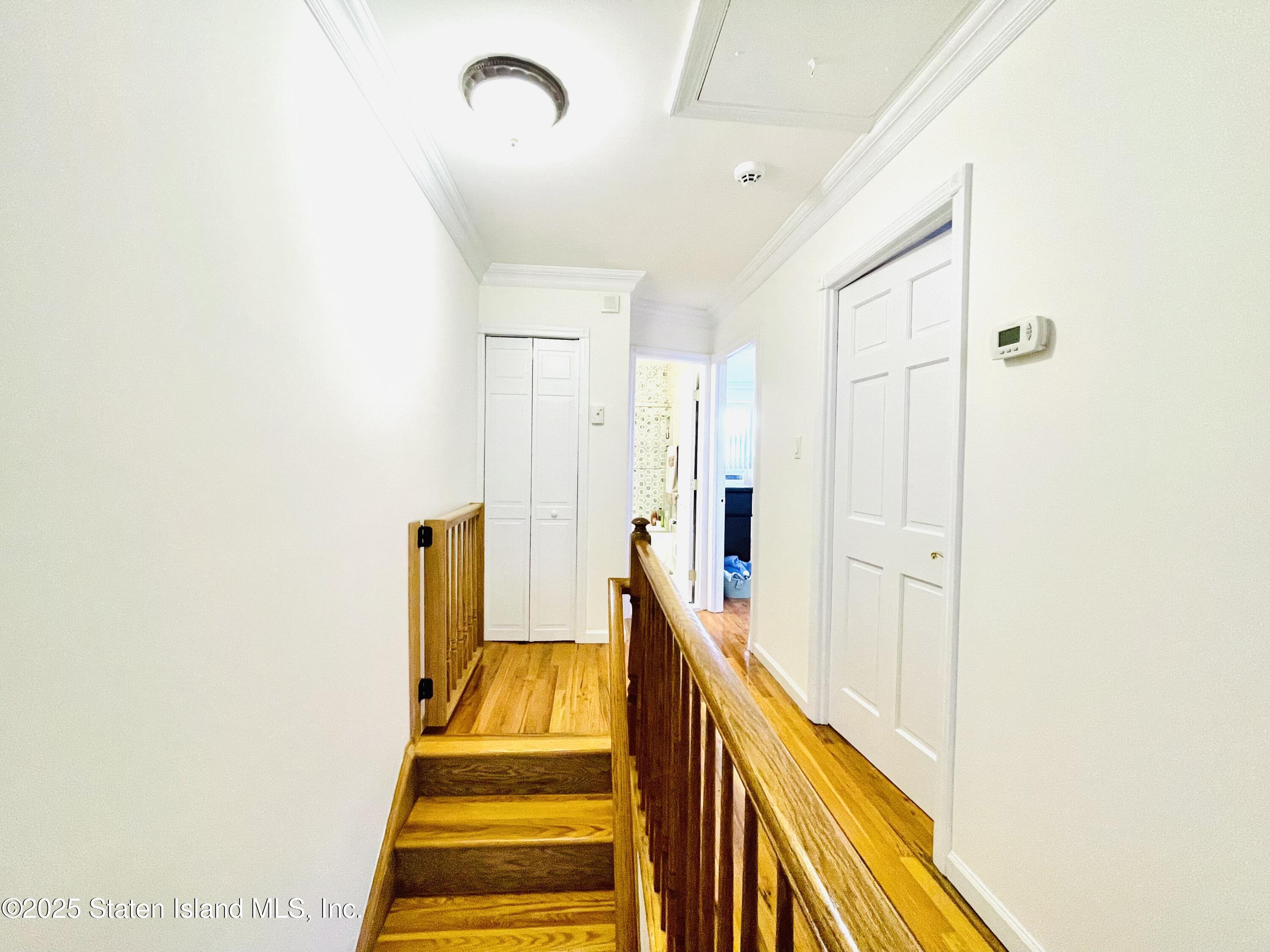 10 Token Street Staten Island, NY 10312 - Photo 18 of 39 a view of a hallway with staircase