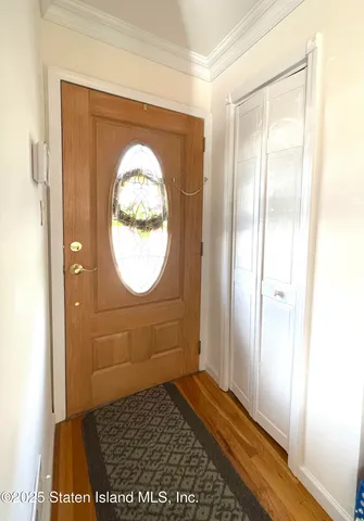 a view of a bathroom with a sink and a window