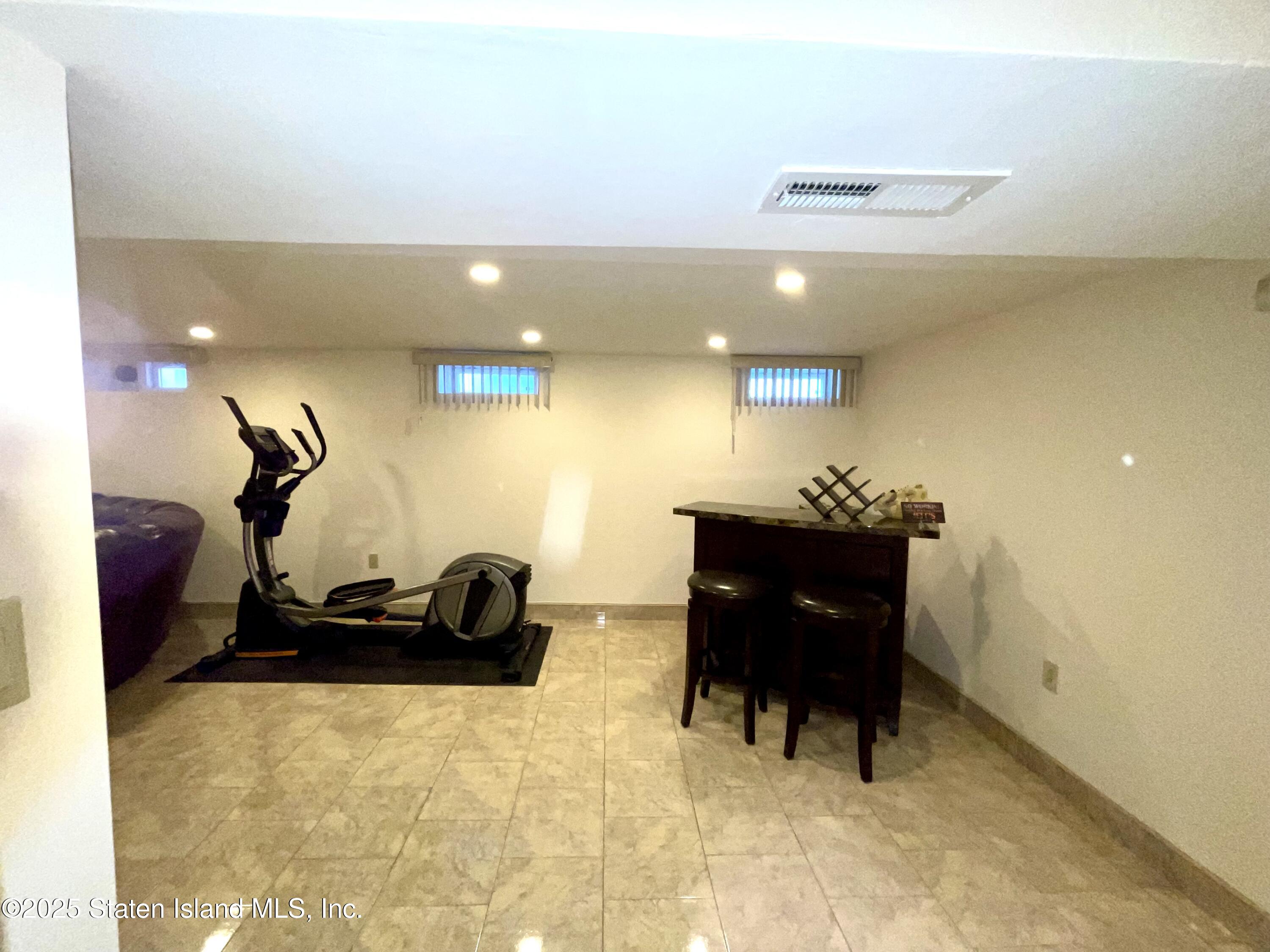 10 Token Street Staten Island, NY 10312 - Photo 32 of 39 a room with gym equipment