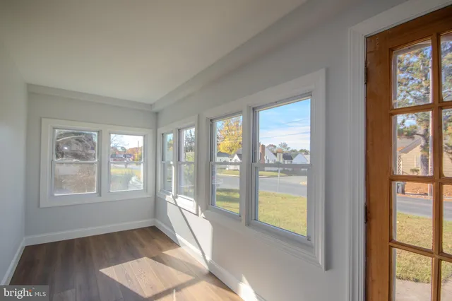 a view of an empty room and window