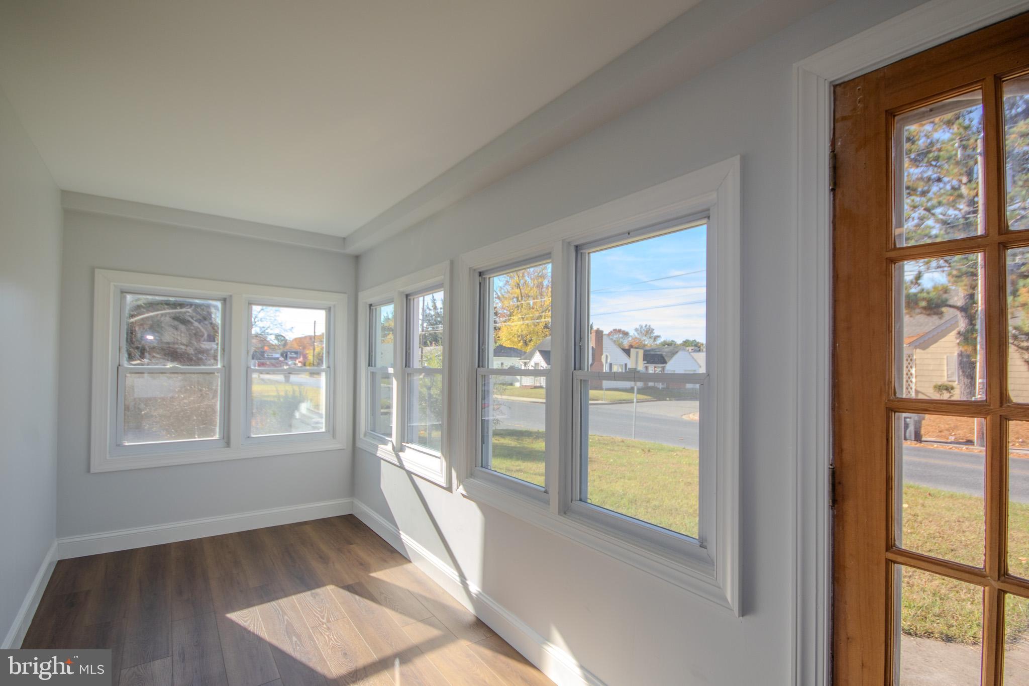131 Truitt Street Salisbury, MD 21804 - Photo 4 of 29 a view of an empty room and window