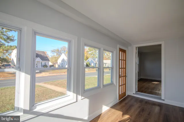 a view of an empty room and window