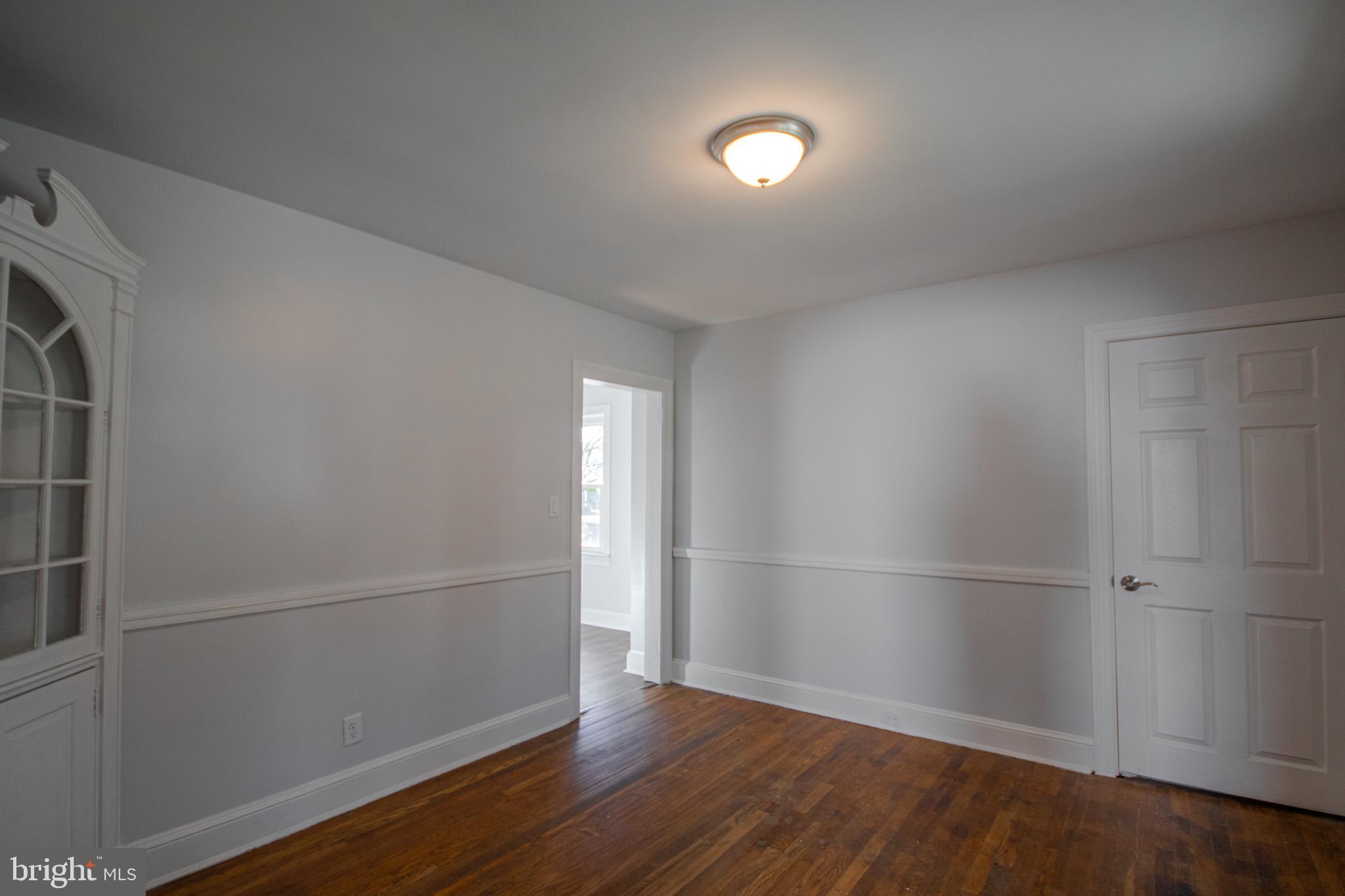 131 Truitt Street Salisbury, MD 21804 - Photo 9 of 29 a view of empty room with wooden floor