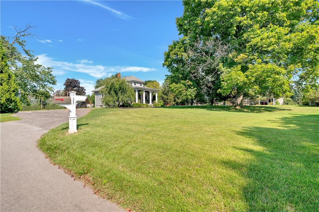 2085 Ridge Rd Extension Ambridge, PA 15003 - Photo 3 of 25 a view of a garden with a building