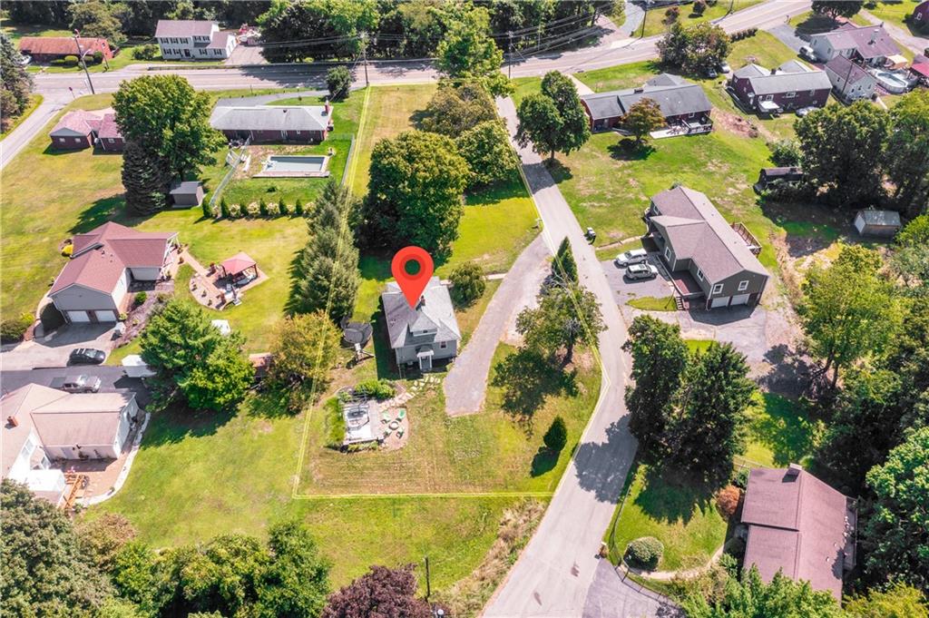 2085 Ridge Rd Extension Ambridge, PA 15003 - Photo 7 of 25 an aerial view of residential houses with outdoor space and swimming pool
