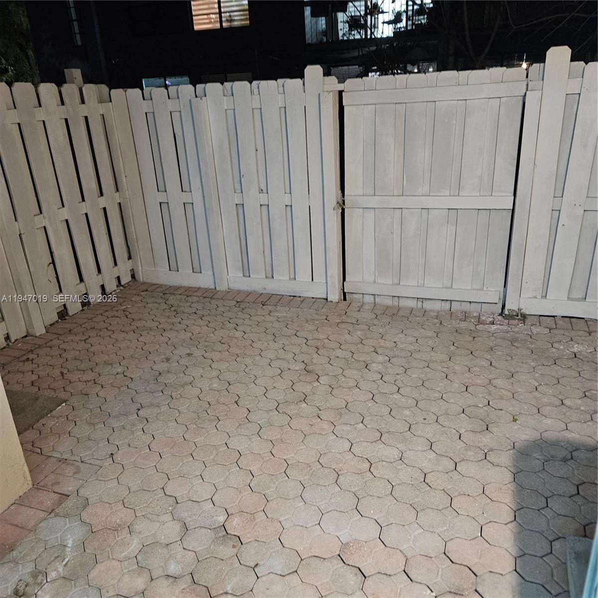 6309 Southwest 138th Place Miami, FL 33183 - Photo 3 of 17 a view of wooden fence