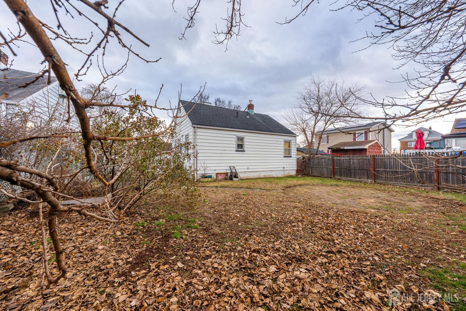 81 Larch Street Port Reading, NJ 07064 - Photo 20 of 25 a backyard of a house