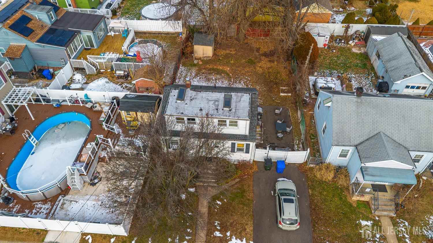 81 Larch Street Port Reading, NJ 07064 - Photo 23 of 25 an aerial view of residential houses with outdoor space