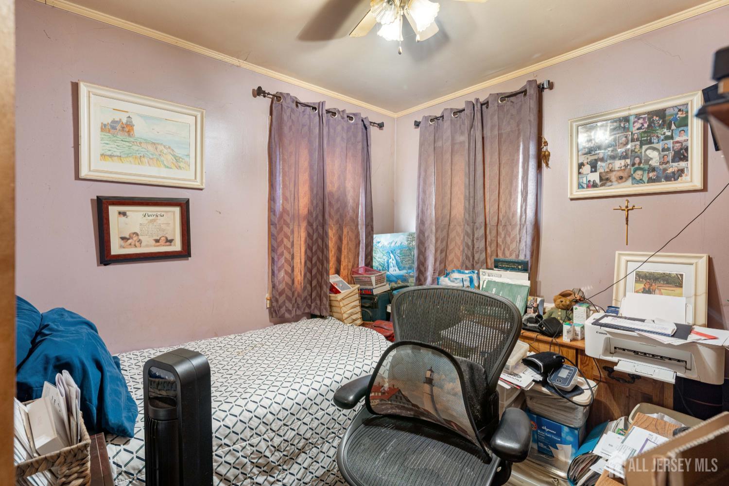 81 Larch Street Port Reading, NJ 07064 - Photo 8 of 25 a bedroom with furniture and a window